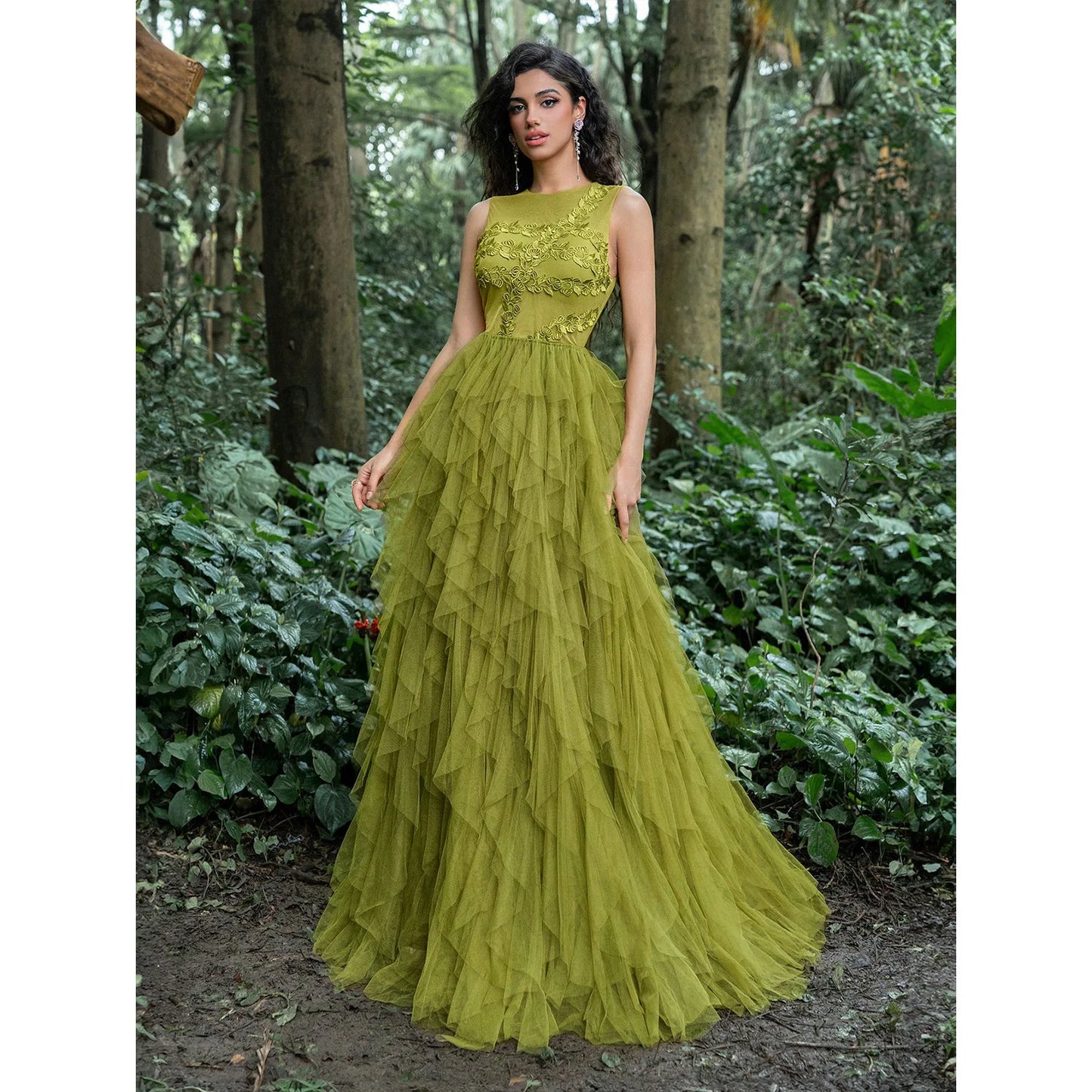 Luxurious party dress featuring a round neck, sleeveless design, leaf embroidery, and a multi-layered mesh