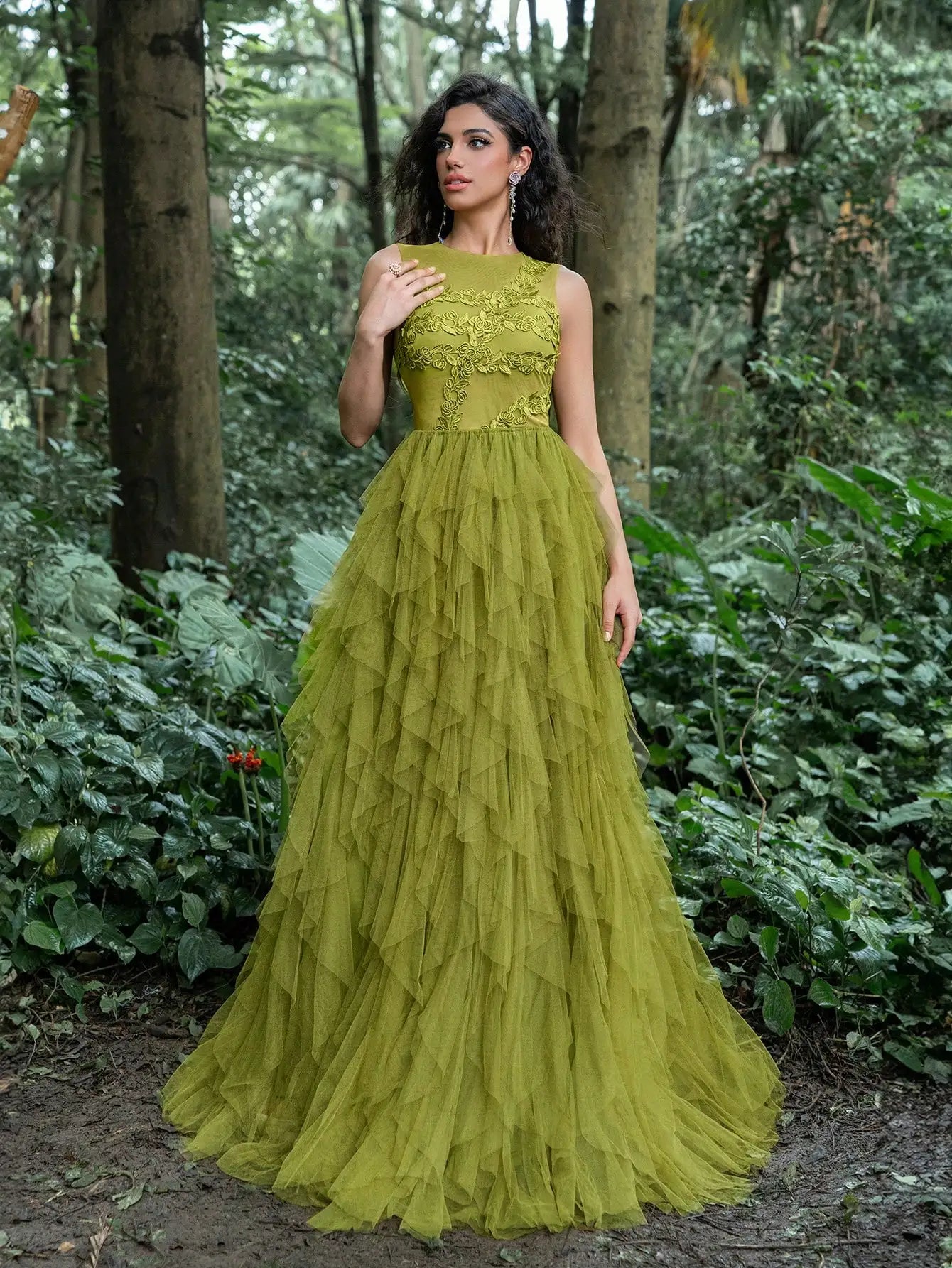 Luxurious party dress featuring a round neck, sleeveless design, leaf embroidery, and a multi-layered mesh